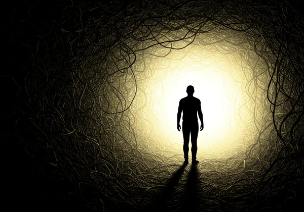 Person stepping from darkness into light, symbolizing healing.