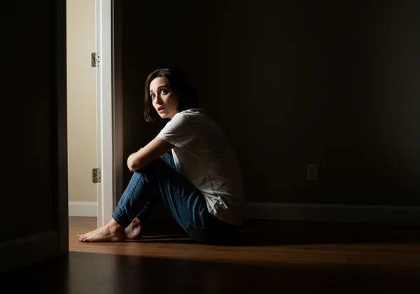 Person on edge, a sign of relationship PTSD.